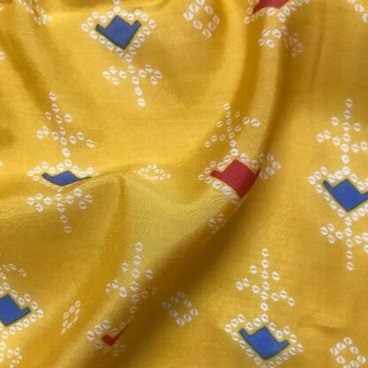 white bandhej dots print yellow viscose muslin fabric