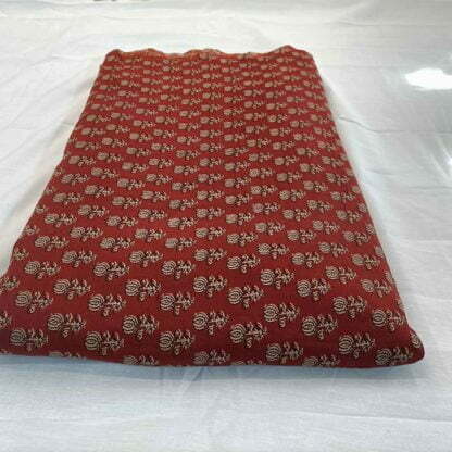 poly muslin brick red floral fabric