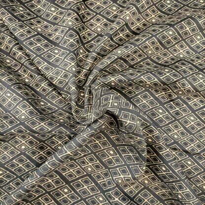 square figures dark grey poly muslin fabric