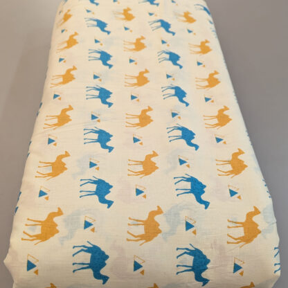 camel prints cream cotton fabric